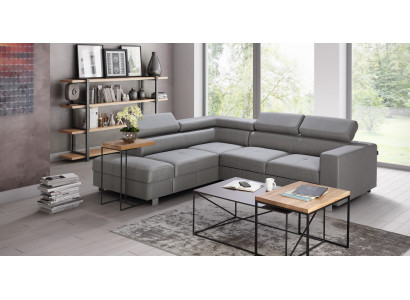 Šedý rohový gauč s funkcí postele, moderní design ve tvaru L