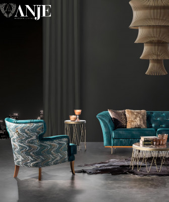 Luxusní souprava pohovky a křesla do pohodlného obývacího pokoje v moderním materiálu