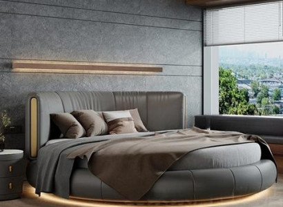 Exkluzivní šedobéžová kulatá postel s moderním designem do ložnice