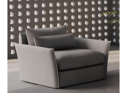 Moderní křeslo s důrazem na pohodlí v obývacím pokoji