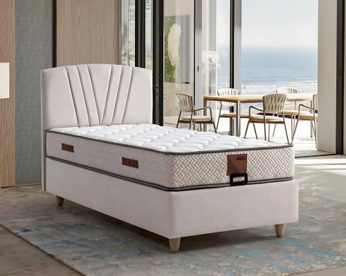 Elegantní postel s matrací v béžovém materiálu