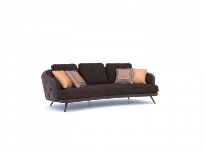Třímístná pohovka Chesterfield pro luxusní obývací pokoj.