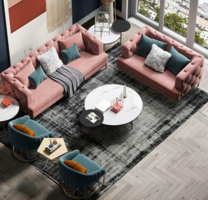 Tříkřeselná relaxační designová pohovka s loungovým textilním potahem.