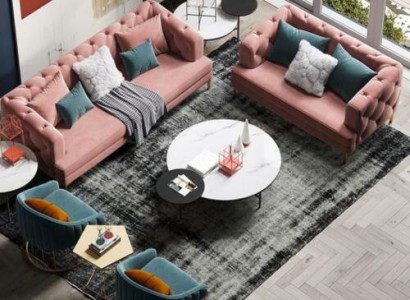 Tříkřeselná relaxační designová pohovka s loungovým textilním potahem.