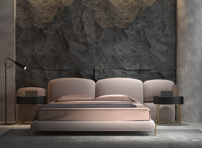 Velká béžová ložnice s manželskou postelí, designovou širokou textilní hlavovou částí.