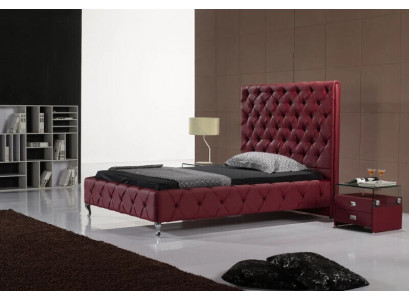 Návrhářská postel Chesterfield ze skutečné kůže na hotelové posteli luxusní dvoulůžkové ložnici.