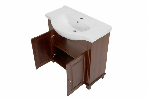 Nábytek do koupelny umyvadlo v antickém stylu s umyvadlem a skříní venkovského domu.