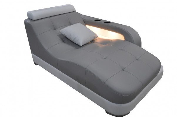Designer Pohovka z pravé kožešiny s otomanem v moderním šedém provedení.