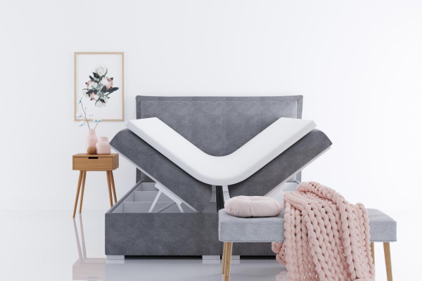 Moderní hotelové postele Boxspring, dvojité luxusní postelové polštáře, funkční lůžka s látkou.