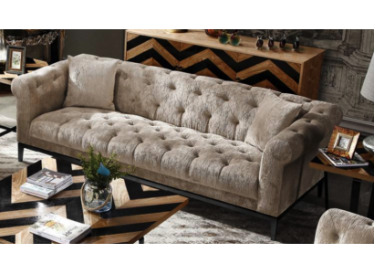 Elegantní luxusní pohovka Chesterfield s potahem z látky nebo kůže.