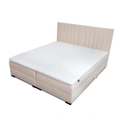Comfortable and functional bed is made of high quality material in a modern style