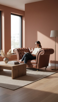 Luxus křeslo Chesterfield v koženém provedení, hnědé barvy, moderní lounge design.
