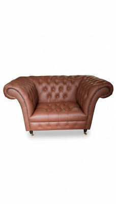 Luxus křeslo Chesterfield v koženém provedení, hnědé barvy, moderní lounge design.