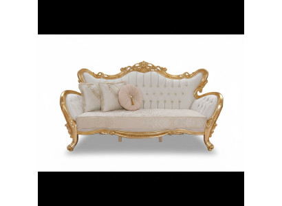 Ein luxuriöses und entspannendes Sofa im klassischen Stil mit goldenen Mustern